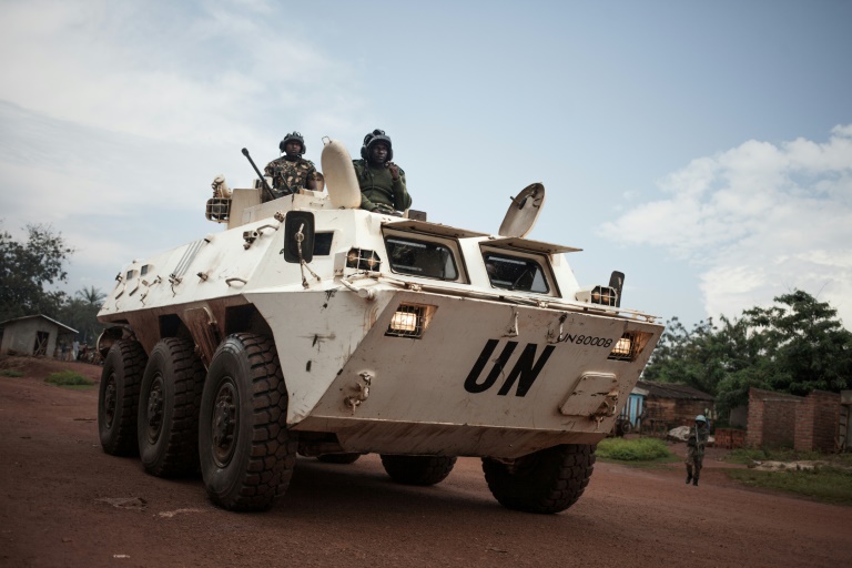 Tanzanian soldiers from the UN peacekeeping mission patrol a town threatened by the Siriri group of Fulani cattle herders | Â© AFP/File | FLORENT VERGNES